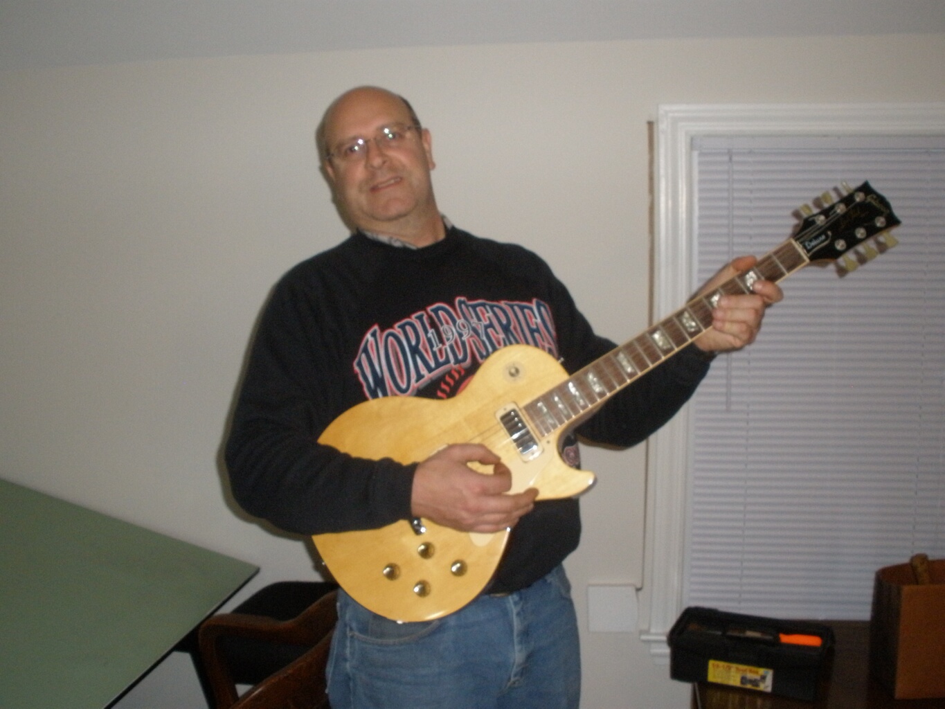 Ed Hauser jamming on Les Paul guitar