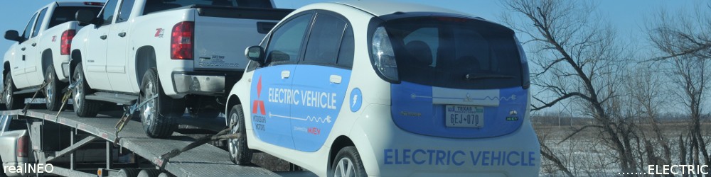 realNEO Electrib Header featuring first Mitsubishi electic car model shown in America