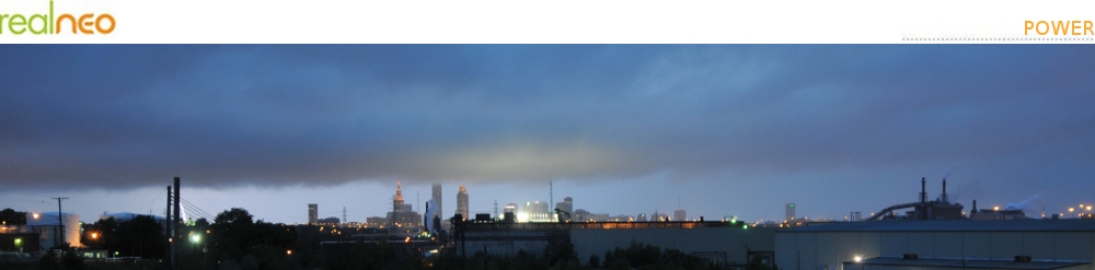 Cleveland skyline illuminated by lightening and Progressive Field