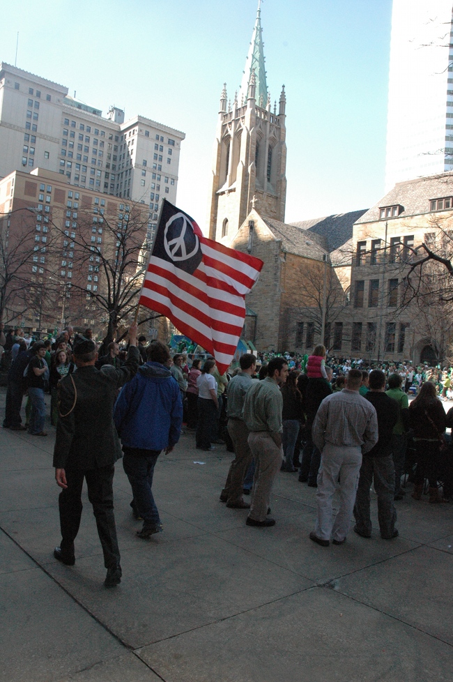 Lou Pumphrey in uniform with Peace Flag marching in 2009 Cleveland St. Patrick's Day Parade