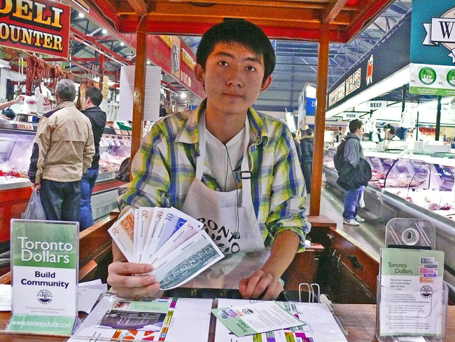 Toronto Dollars vended by Yifan at St Lawrence Market Toronto Canada image jeff buster 11.20.10
