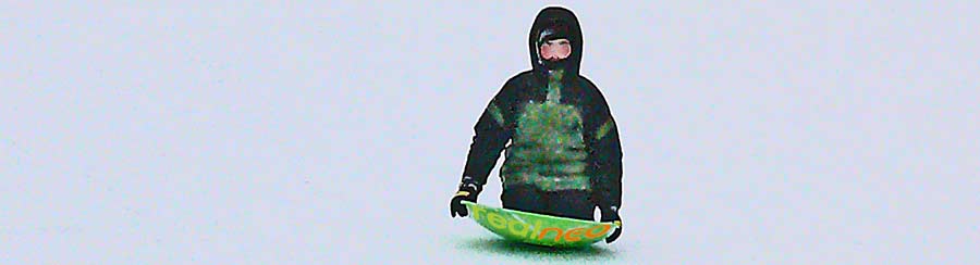 image jeff  buster 01.02.10 snow disc sledding
