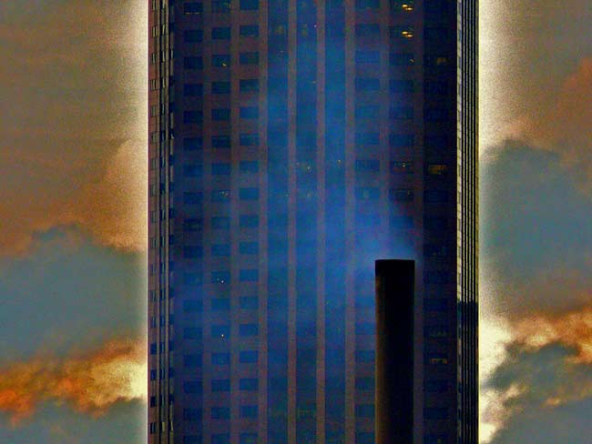 cleveland thermal coal fired steam heat facility exhaust pollution against bp british petroleum tower background image 10.23.09 jeff buster
