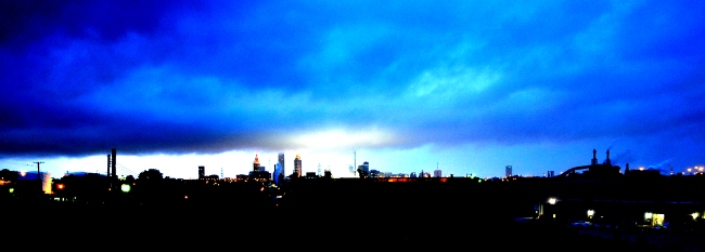 Cleveland skyline illuminated by Progressive Field and lightning