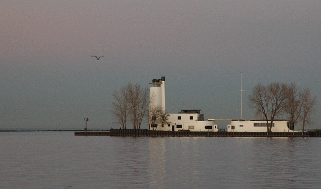 Decaying City of Cleveland Historic Landmark Coast Guard Station being demolished by neglect