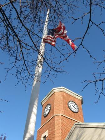 Flag half mast and tattered