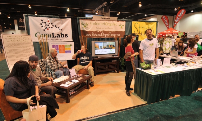 KushCon2 vendors in this one booth include a testing lab, MMJ dispensary, and producer of MMJ granola