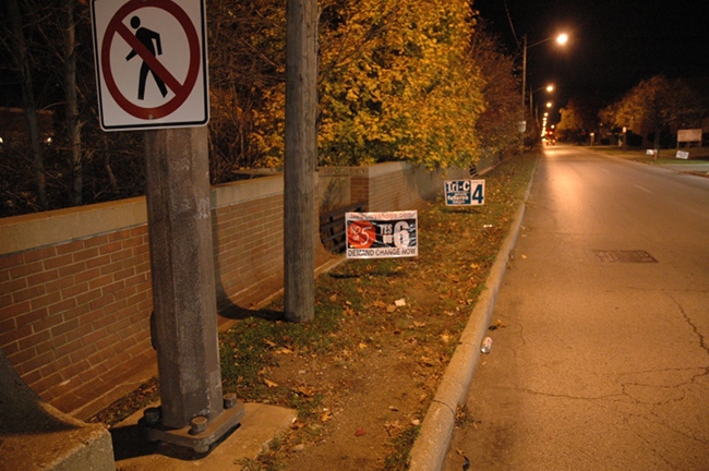 Illegal Issue 6 and Issue 4 signs at RTA property in Shaker Boulevard in Cleveland