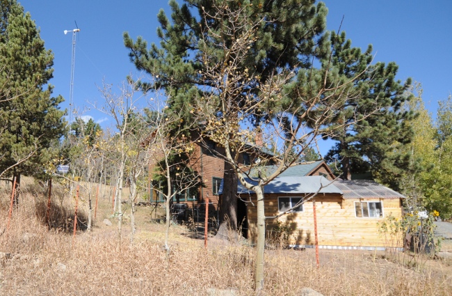  Fourmile Canyon Wildfire, West of Boulder, Colorado, September 2010 - off-the-grid home with wind turbine, solar and greehouse beyond the fireline