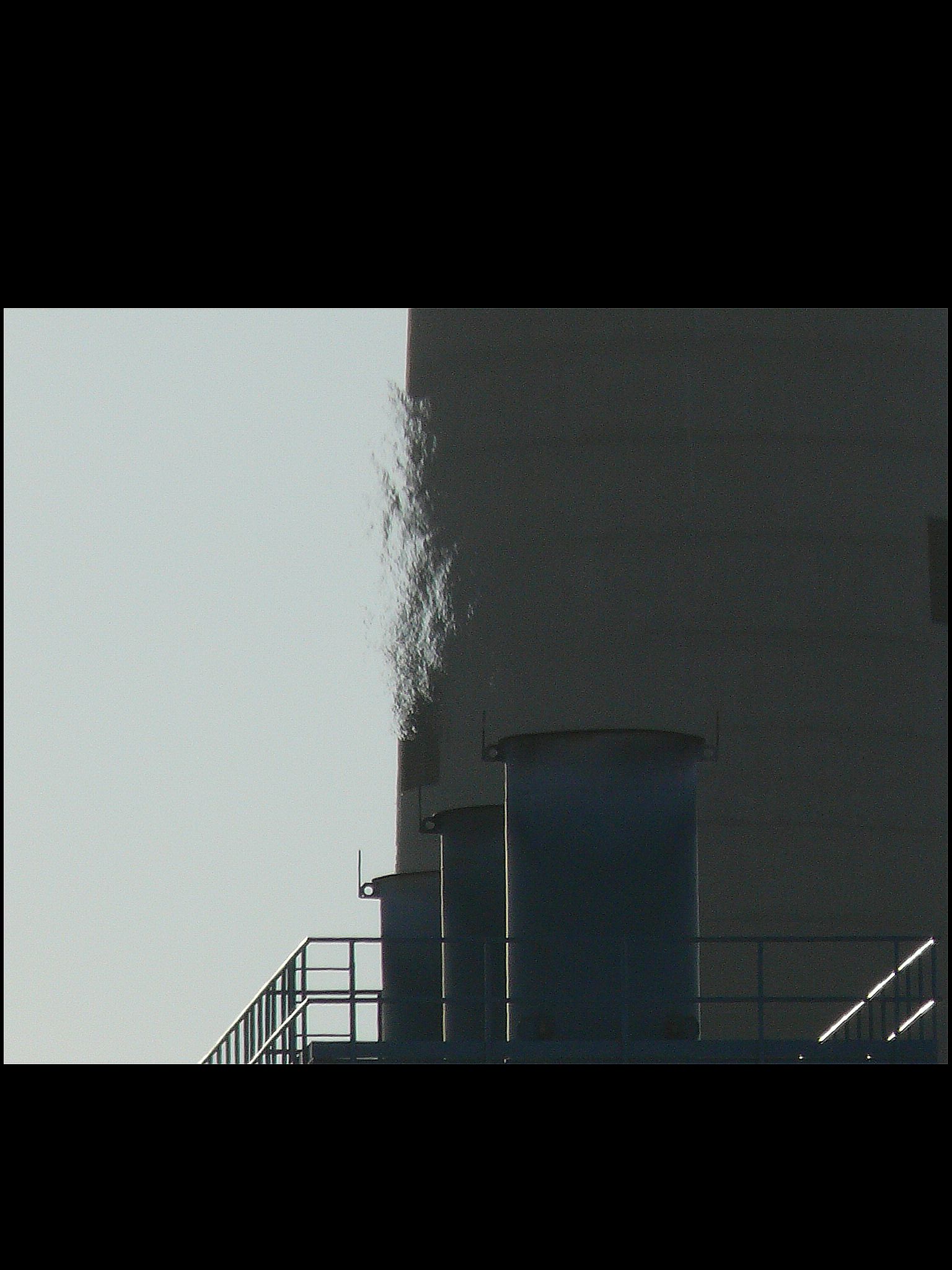 thermal or and chemical light refraction over sewer facility exhaust image jeff buster