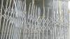 storefront grate held up with yellow string in Cleveland