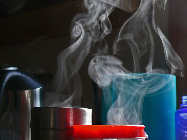 steam vapor clouds over hot coffee in morning sunlight image jeff buster 4.7.10