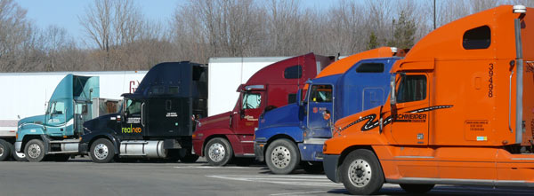 tractor trailers at rest stop image jeff buster